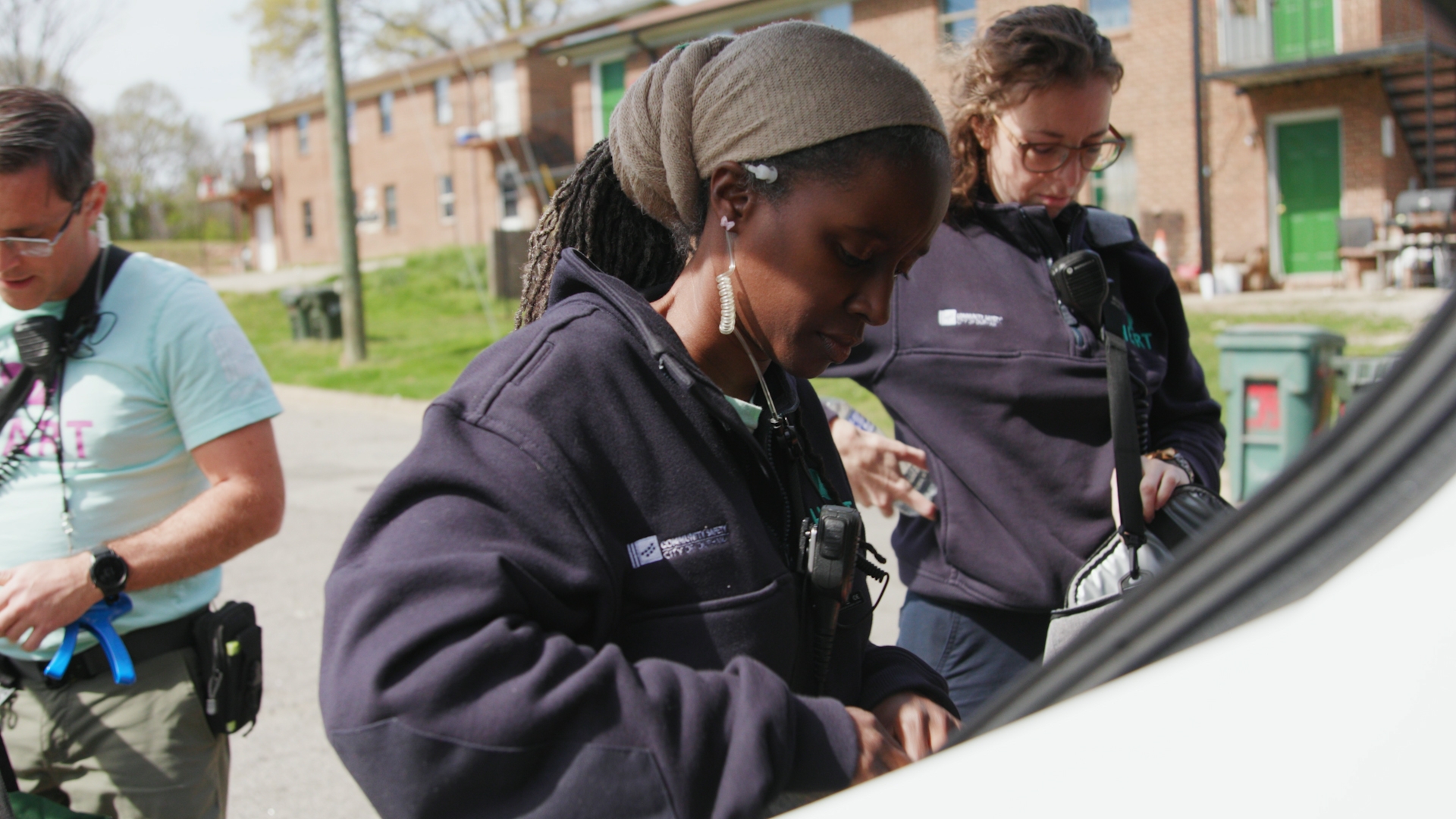 Women at car trunk